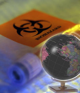 Globo terraqueo y se�al de peligro biologico